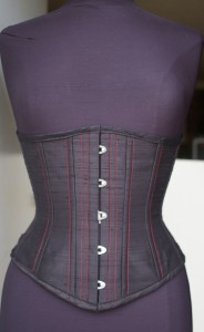 An Exquisite Restraint Underbust Corset, off-the-rack