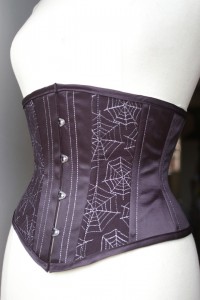 Our fave silver metallic spider webs on black in theExREz Corsets Etsy Store